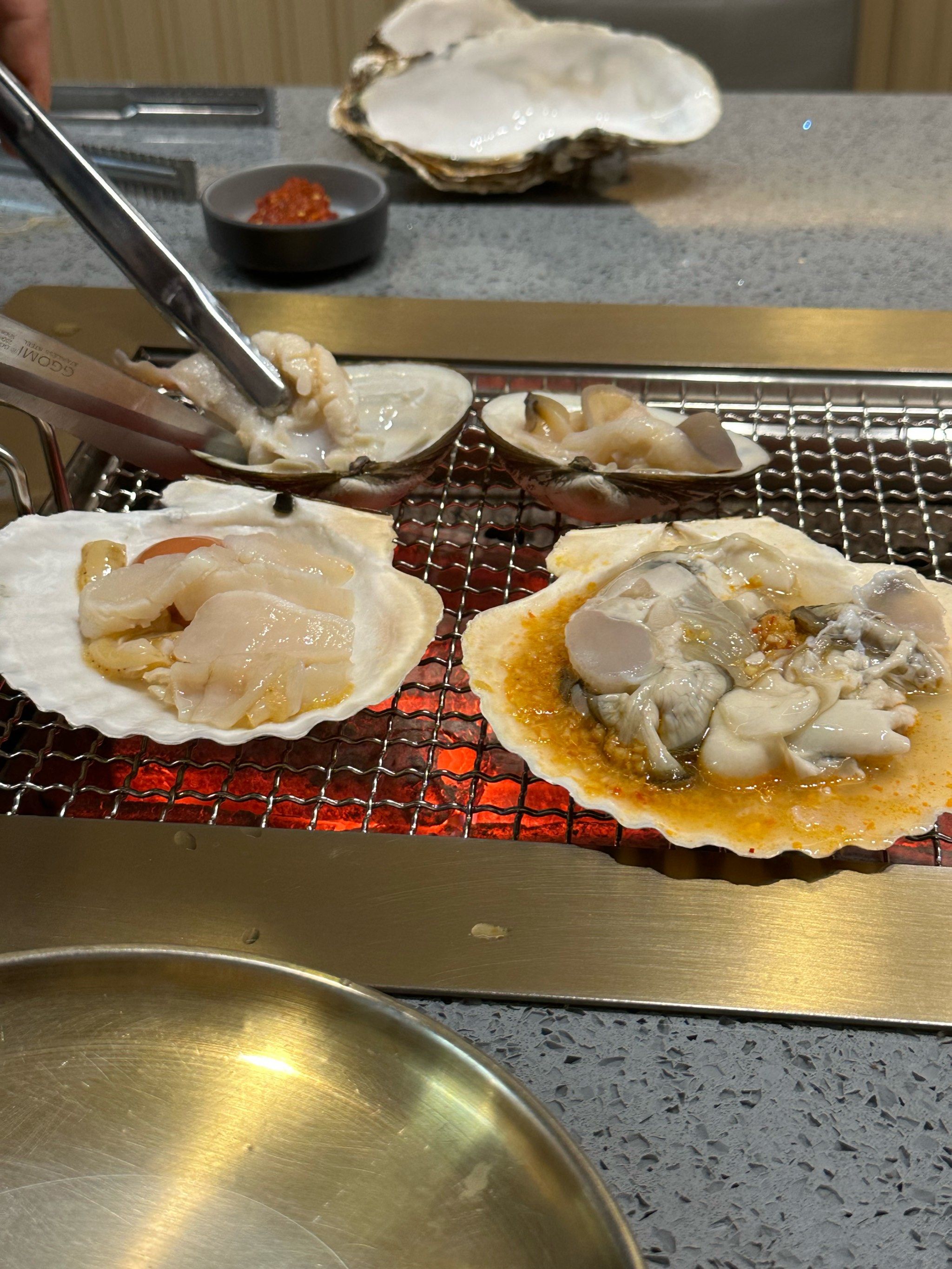 腿间微启，诱人扇贝图之下的美食探索